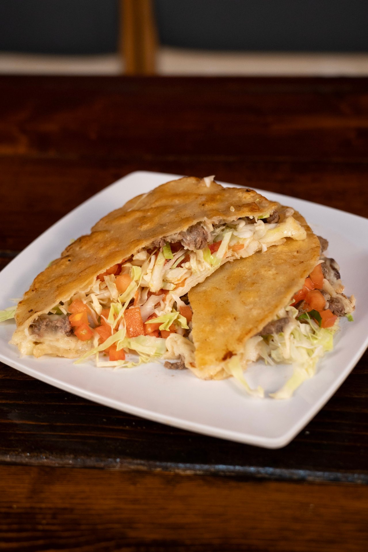 Grilled steak quesadilla with cheese and cabbage